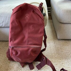 Hydroflask waterproof backpack with hydration pouch and straw